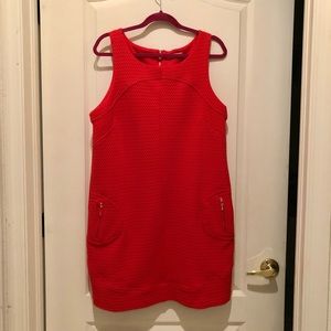 Established 1962 sleeveless dress with gold accents zipped pockets and back